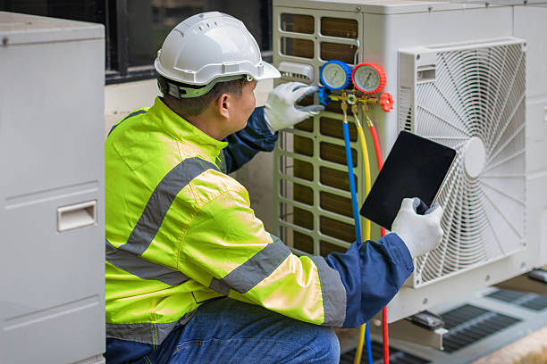 Professional Emergency Hvac Repair technician working in South Amana, IA